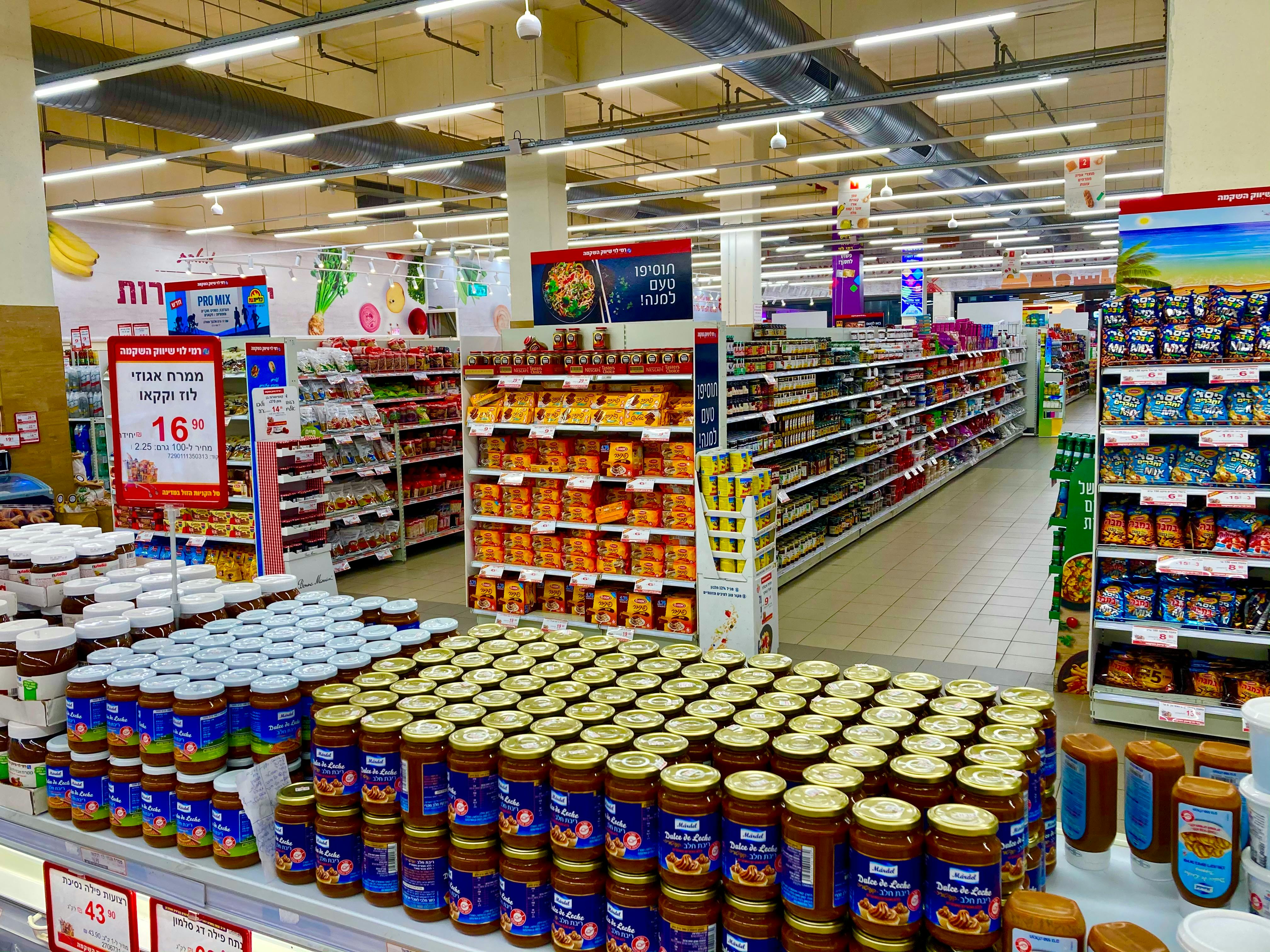 Consumer goods and FMCG — retail shelves, packaged products, distribution center