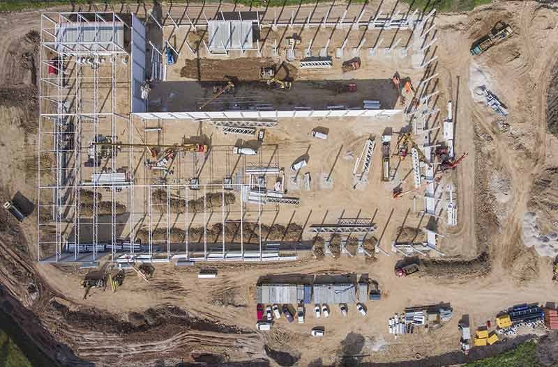 Construction site aerial view — large development project showing scale of infrastructure being built