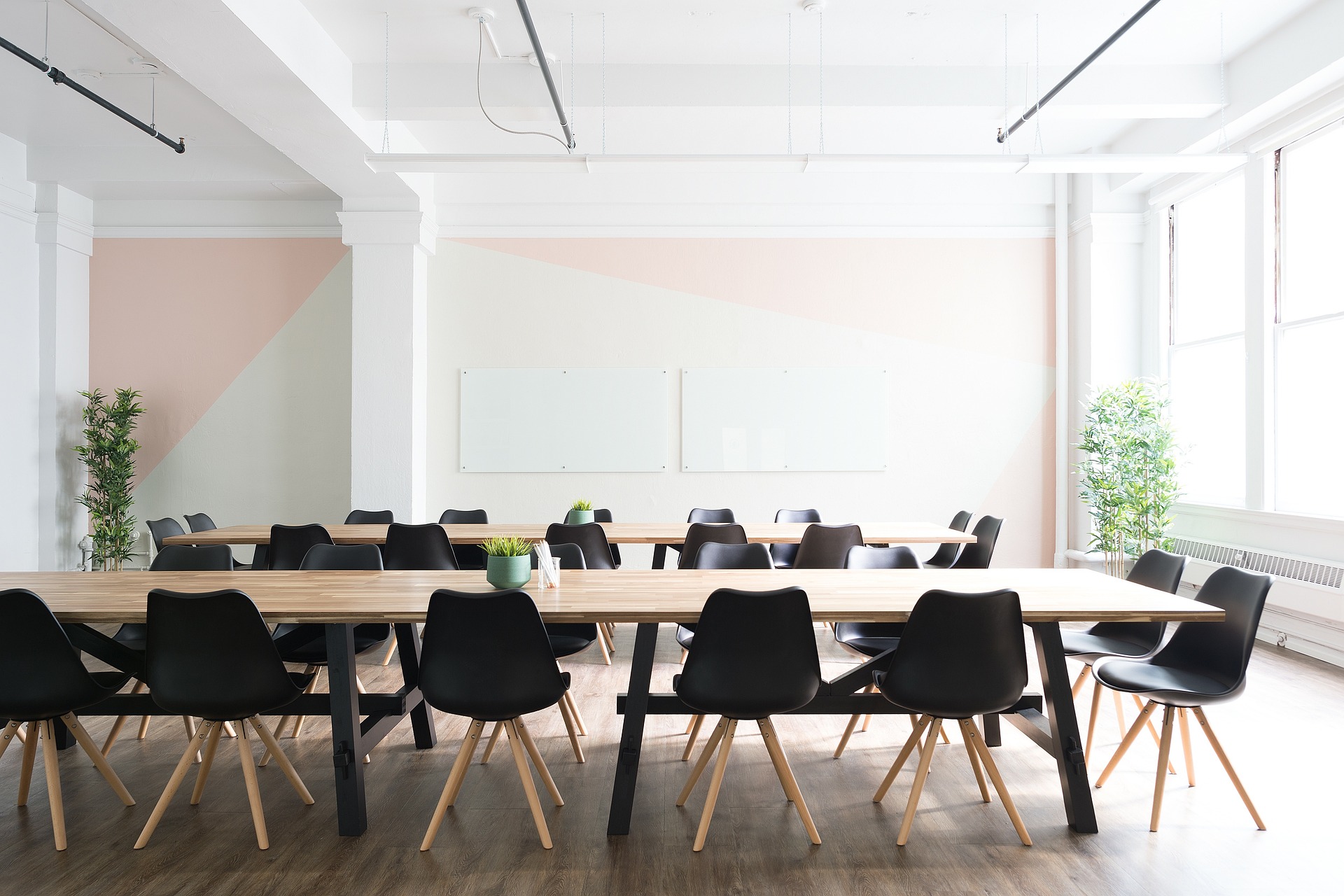 Corporate boardroom — investment meeting with finance professionals and charts